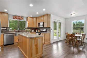Enjoy easy mornings in the connected breakfast nook just off the beautifully updated kitchen.