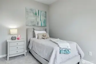 Third bedroom located on the top floor with new carpeting, and ample closet space.