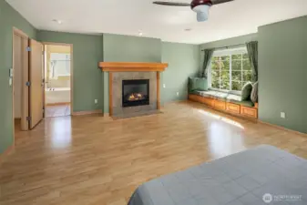 Oversided primary with fireplace and built-in seating