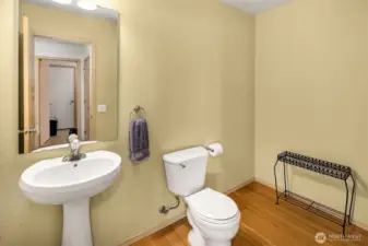 Main floor powder room - large enough to add a shower???