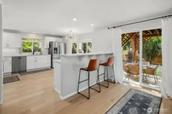 Sliding door out to the back yard.  More space for entertaining.