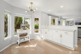 Kitchen can be an eat-in space, now used as a coffee bar at the bay window