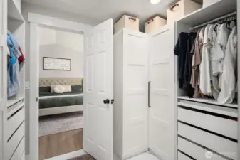 A custom-built closet with excellent organization.