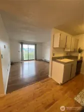 Wider view, kitchen and main living space