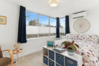 Second bedroom is bright and cheerful with lots of space