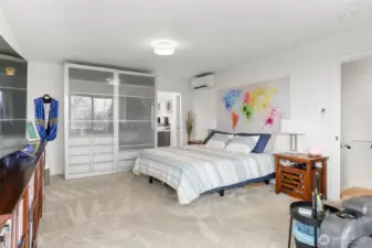 The primary bedroom is spacious and comfortable with upgraded carpet and thick padding.