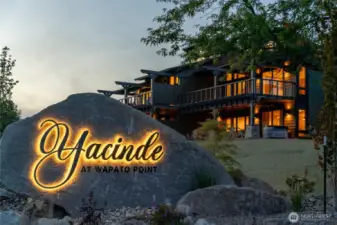 Yacinde entry sign at dusk