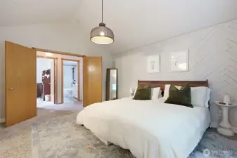 Double door entrance to primary bedroom ...