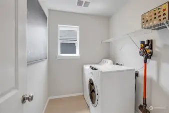 Laundry room conveniently located on upper level, no more dragging laundry downstairs.