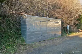 Storage area out front of home.