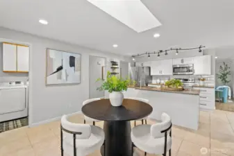 Just off the kitchen and dining room, the spacious laundry room offers potential to transform into a second bathroom with a little creativity and effort!