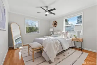 The spacious second bedroom comes with a ceiling fan for those warm summer days—though you’ll stay cool and comfortable with the AC that works like a charm!