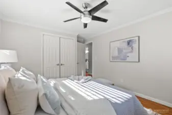 The spacious second bedroom comes with a ceiling fan for those warm summer days—though you’ll stay cool and comfortable with the AC that works like a charm!