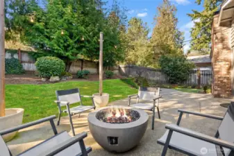 The expansive fenced backyard provides total privacy, creating a peaceful retreat right at home.