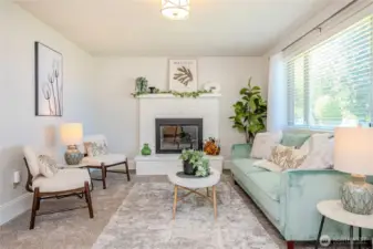 Love the plush new carpeting, light fixture and the white brick fireplace surrounnd!