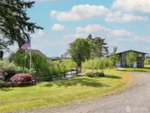 15 Acres & 6 Outbldgs, RV dump hookup to the right of home.