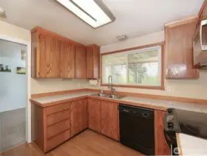 Kitchen overlooks acreage, access to covered back deck
