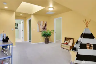 Computer room or huge storage room adjoining skylighted flex room.