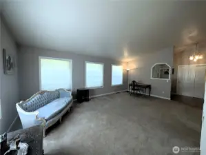 Large Living Rm with lots of natural lighting. #2835 Cooper Point Rd NW, Olympia, WA 98502