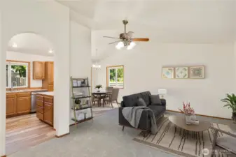 Spacious Open Floor Plan Seamlessly Connecting Kitchen, Dining & Living Areas – Ideal for Modern Living & Entertaining! Photo is virtually staged.