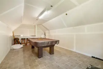 Big enough for billiards and then some—this oversized loft offers serious bonus space.