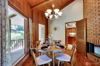 Dining room with fireplace off kitchen