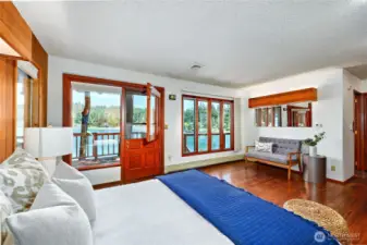 Primary bedroom overlooking water