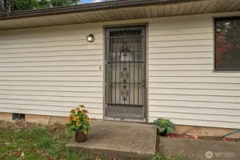 Easy care vinyl siding, and screen door for summer days plus a solid poured concrete foundation provide the practical start and leave an empty canvas for your garden, landscape or front porch creations.