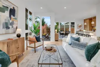 Light filled Living Room with door to outside patio.