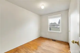 3rd bedroom looking out front. Room is actually wider than it looks in this picture