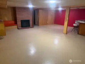 Downstairs Rec room with wood fireplace