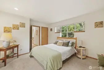 This second upstairs bedroom is so bright, airy and spacious!