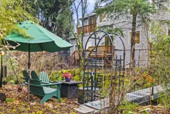Native NW plants like Oregon grape, red twig dogwood, sword fern, wood sorrel, and many others create a lush, private backyard oasis with waves of color year-round.