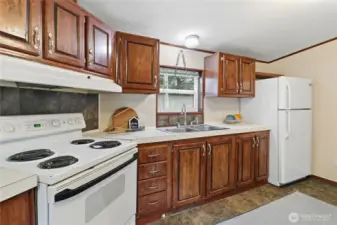 Walk thru kitchen with lots of storage.