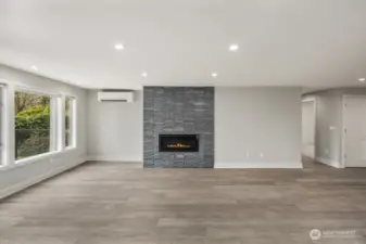 Living room Fireplace with Floor to Ceiling Stone Accent