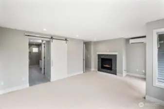 Primary Bedrooms Modern Barn Door Leading too the ensuite