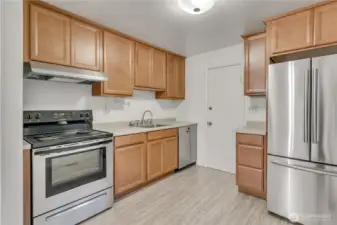 Unit C... remodeled kitchen with newer stainless steel appliances!