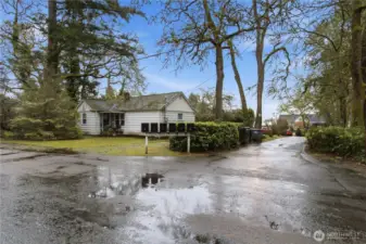 Street view of 2 BR, 1 BA 884 sq ft rental home at American Ave SW street side of the property