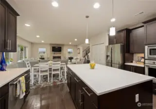 Kitchen into dining area into living room