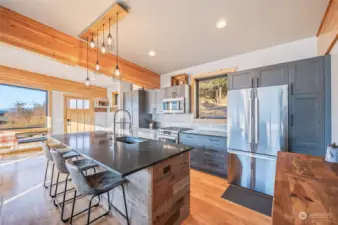 Large kitchen island is ideal for extra seating!