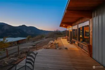 Maybe there's no need to go inside. Maybe, just maybe, living on this impressive deck is enough? Set up your bed on this amazing deck on those hot summer nights and sleep beneath the stars!