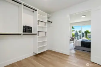 Stay organized with custom closet organizers in the primary closet. Maximize space and efficiency while keeping your wardrobe tidy and accessible.