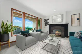 Formal living room with cozy fireplace and an abundance of natural light.  This photo is virtually staged.