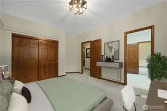 One of four bedrooms - this bedroom shares a Jack-n-Jill bathroom. This photo is virtually staged.