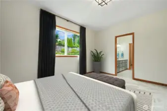 One of four bedrooms - this bedroom shares a Jack-n-Jill bathroom.  This photo is virtually staged.