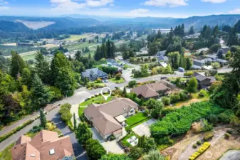 Aerial views of the home and surrounding area. Close to amenities, shopping, restaurants, schools and more!