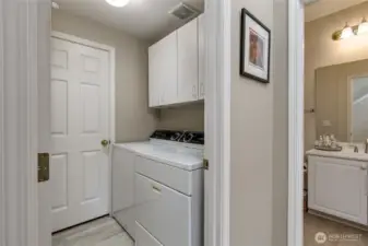 Utility room opens to the attached 2-car garage