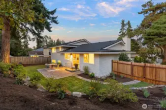 Beautiful landscaped yard with new and mature plantings.