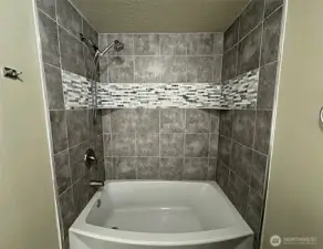 Primary tiled shower/tub