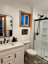 3/4 bathroom in guest house on main floor.